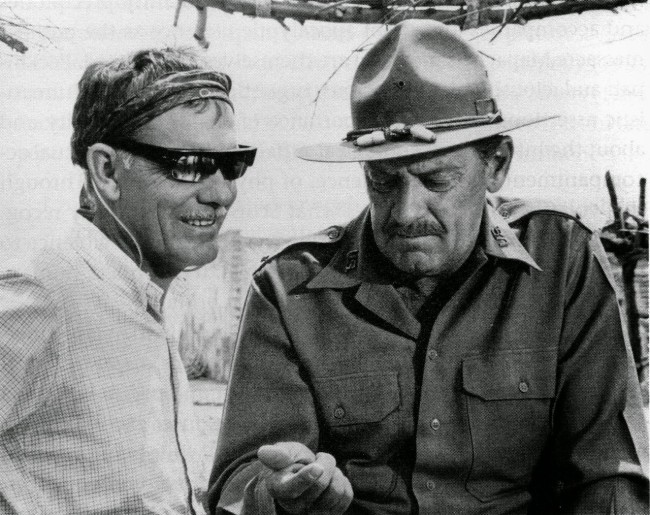 Sam Peckinpah and William Holden at work on 'The Wild Bunch' (1969).