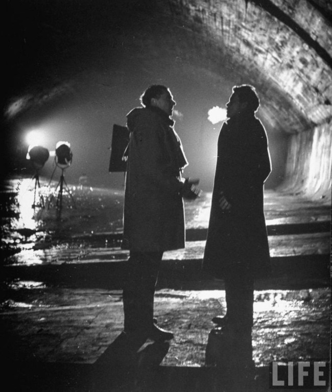 Director Carol Reed in the sewers of Vienna with Orson Welles.