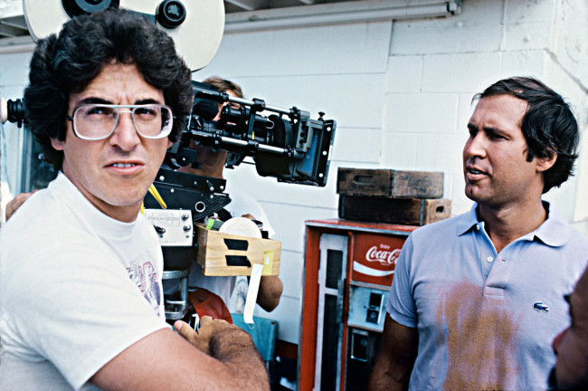Director Harold Ramis and Chevy Chase filming 'Vacation' (1983).